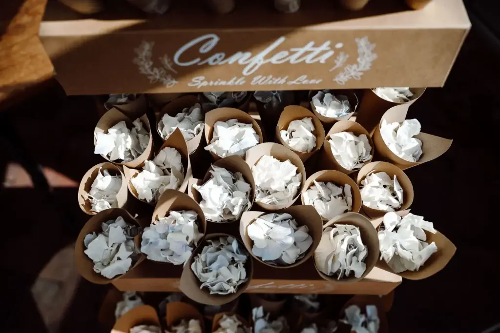 confetti cones in a box at a pear tree at purton wedding