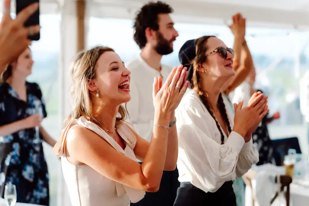recommended suppliers image showing guests clapping at their suppliers inside the marquee