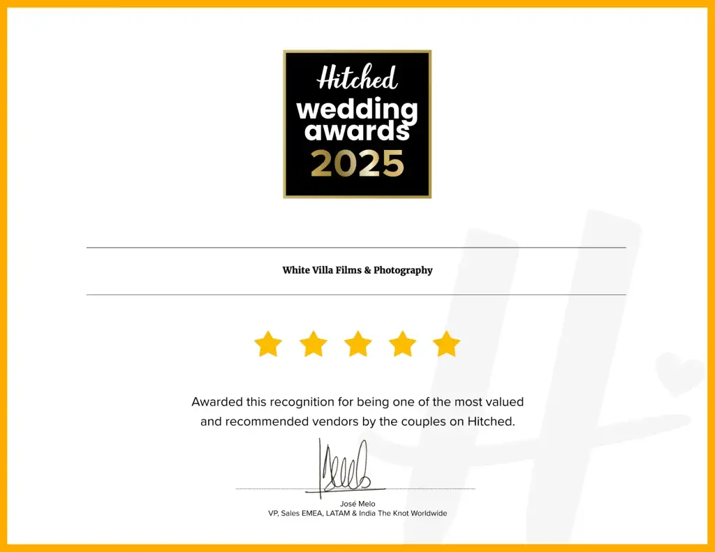 a certificate with five stars rating white villa photography and films as an award winning wedding videographer and photographer 2025